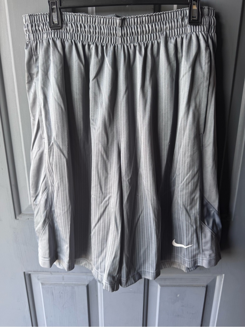 Nike Gray Athletic Shorts with White Swoosh